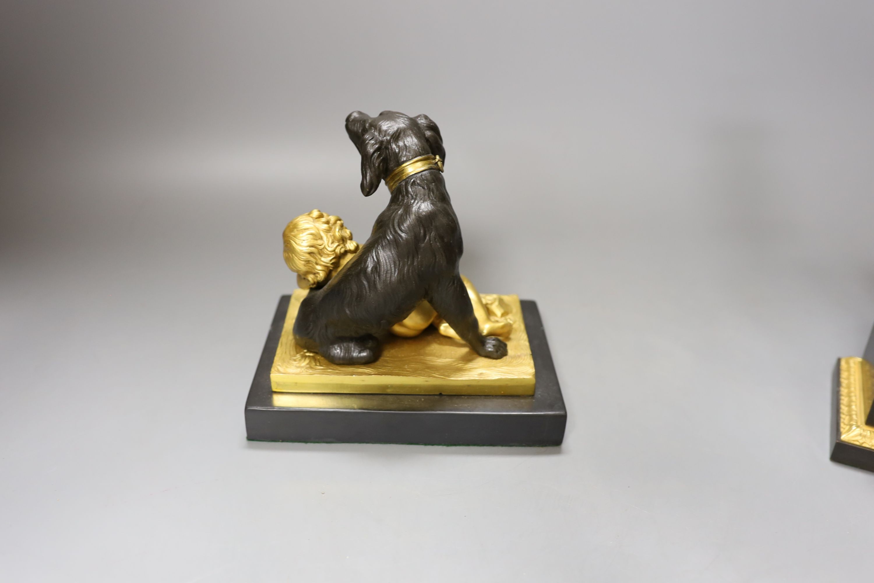 A French style gilt metal ‘urn’ inkstand/pot pourri and similar ‘dog and child’ paperweight. Tallest 19.5cm